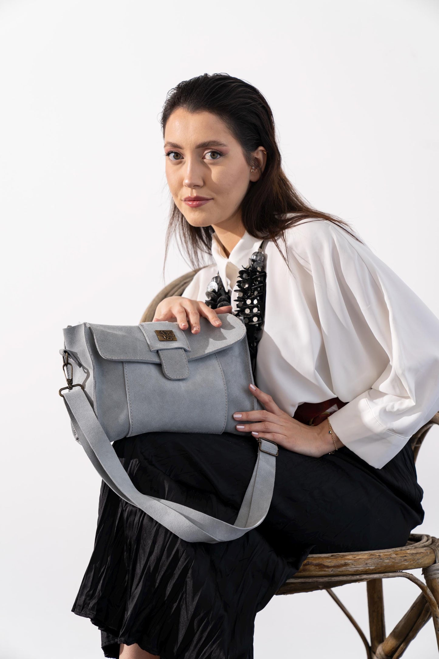The product is made of genuine leather.Name kephren .Shoulder bag