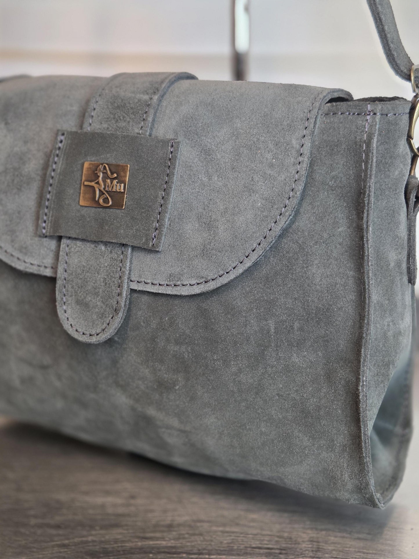 Women's suede handbag, made of genuine leather