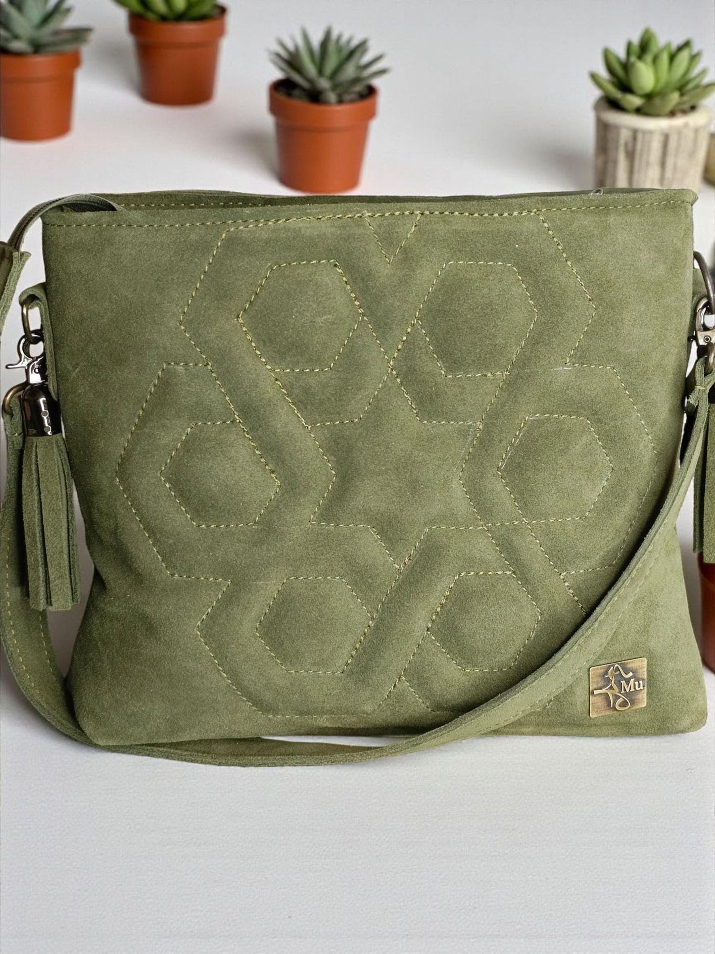 Made of real suede leather. Women's shoulder bag name is Hope