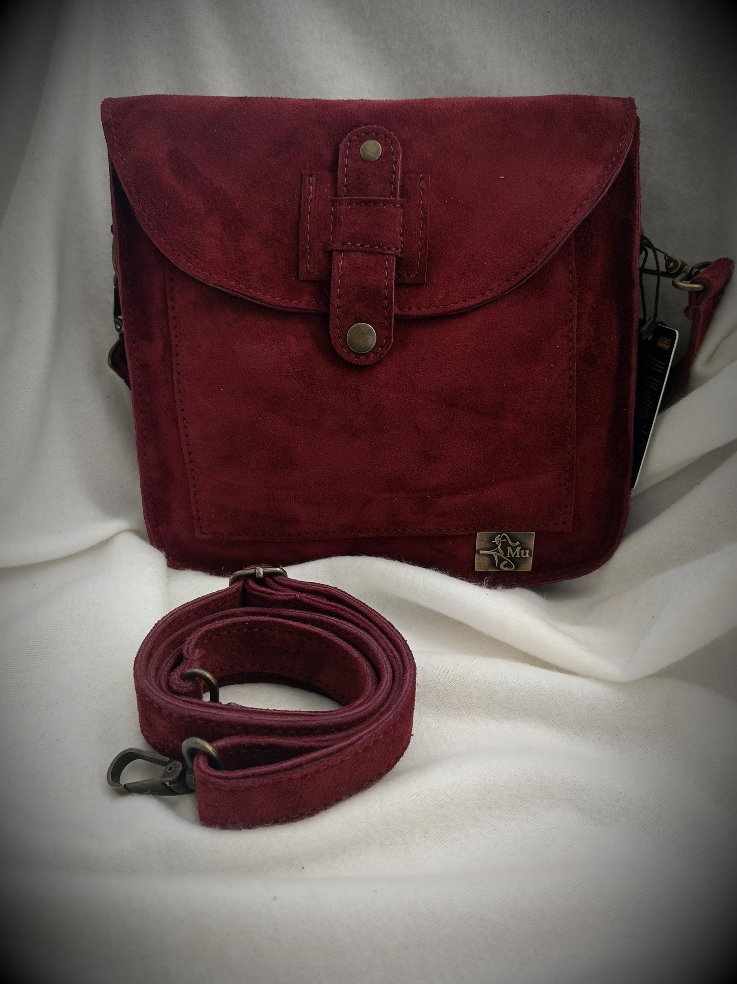 Real suede leather women's bag.carry elegance and comfort on your arm.