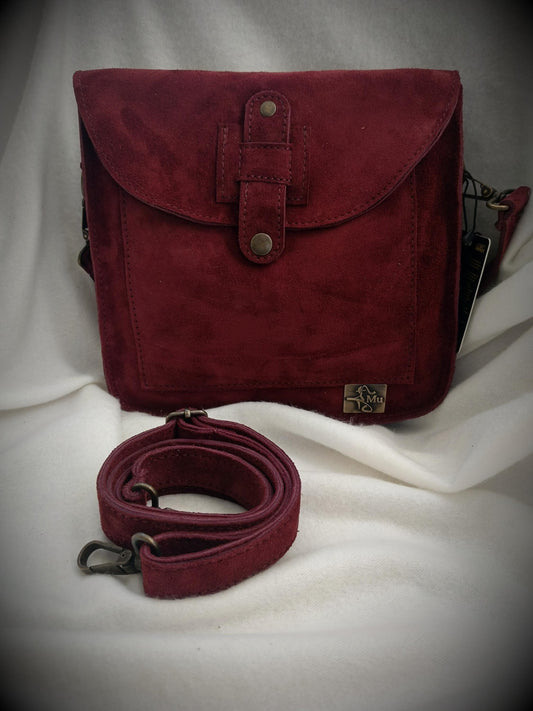 Real suede leather women's bag.carry elegance and comfort on your arm.