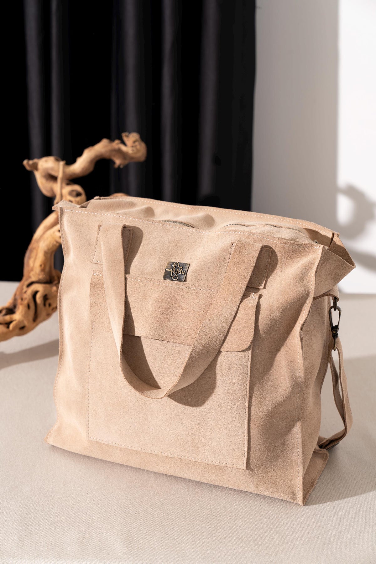 Women's shoulder bag is made of genuine leather.