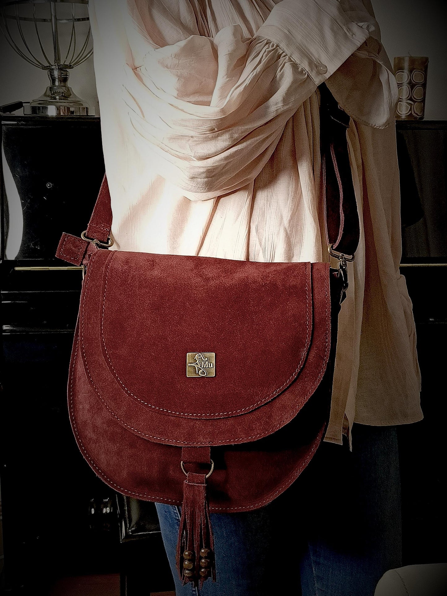 Made of real suede leather. It is a designer product.