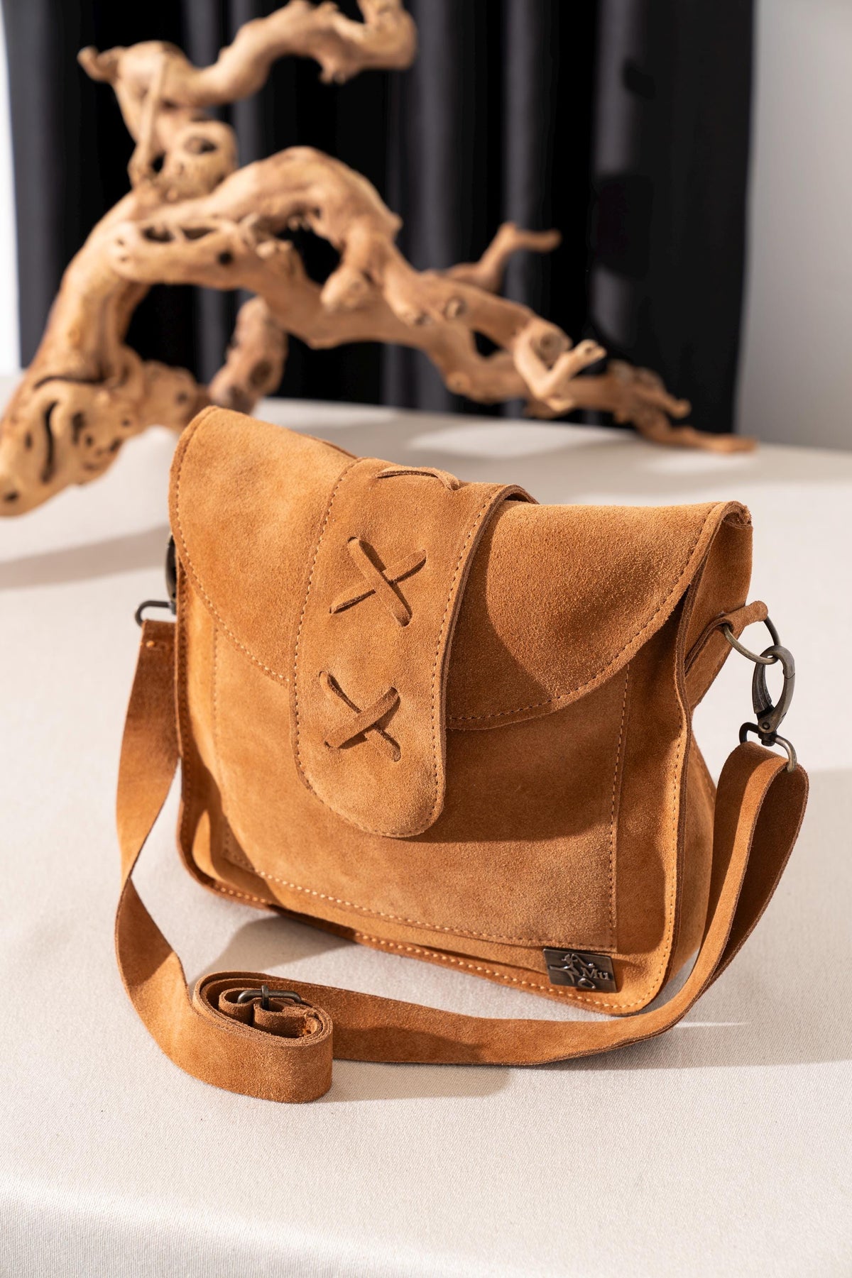 Women's genuine suede leather bag. It is a design product.